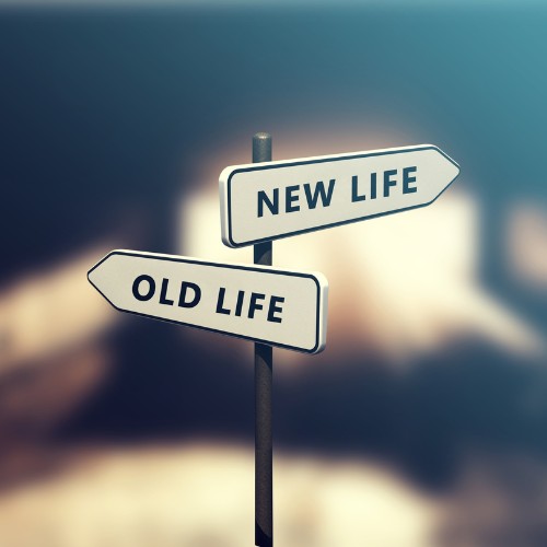 signs with two directions, one says new life, the other says old life