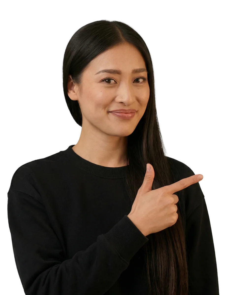 Smiling woman in a black sweater pointing to the side