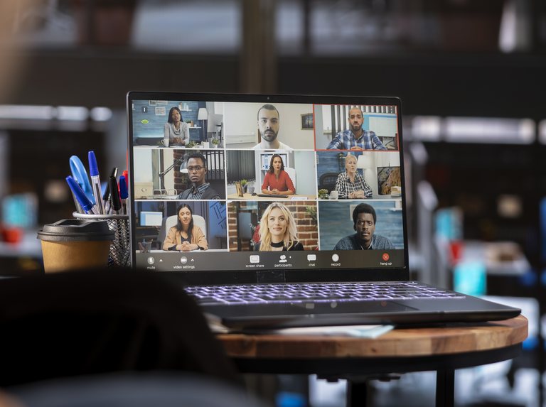 Laptop showing several people in a video call